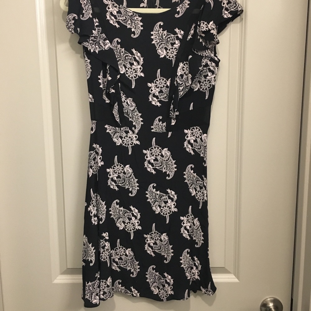 Black dress with mesh cutouts
